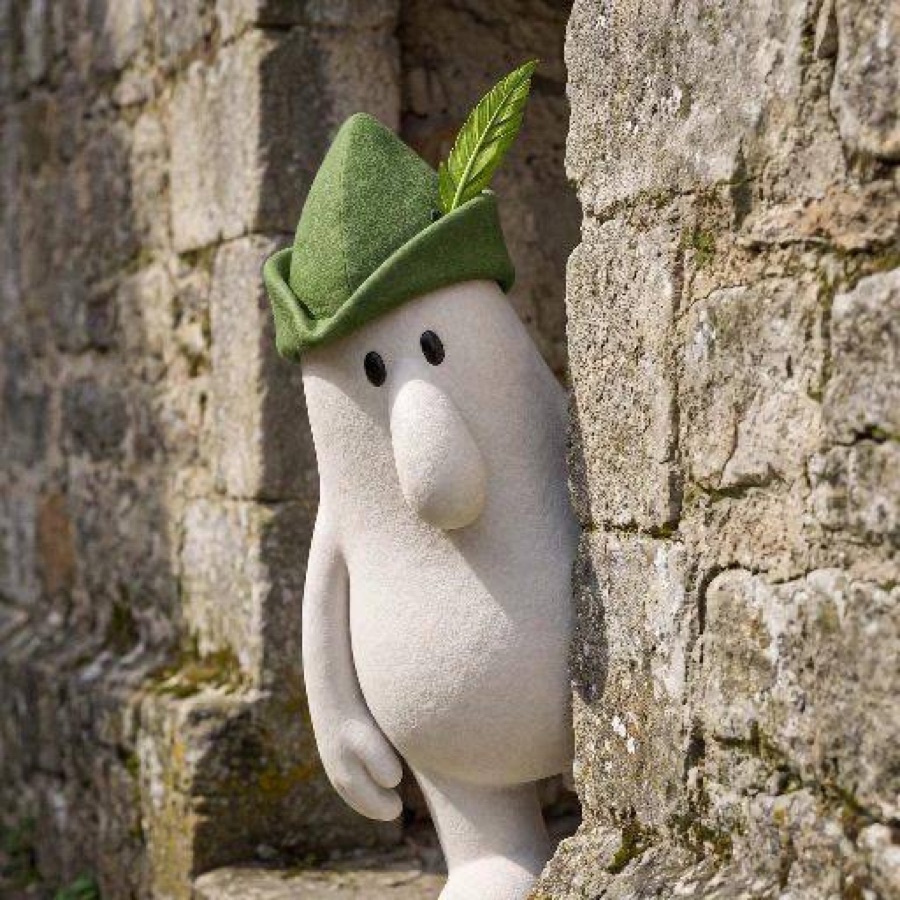 Kilroy peeking around a stone wall